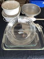Group shot of all items including casseroles, springform pans, glass dishes and hand blender