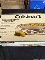 Front of boxed Cuisinart oval buffet server showing product image and capacity