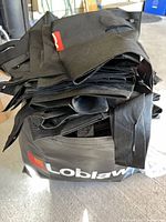 Stack of black PC Optimum grocery bags inside similar bag