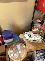 Overview of lot showing tray, containers, placemats, tea cozy, basket with artificial fruit