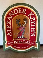 Front view of the Alexander Keith’s foam sign showing full graphics and text