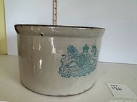 Front view showing blue royal coat of arms transfer and overall form