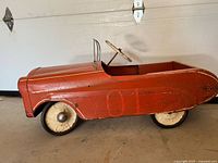 Left side view showing body, wheels and number 01