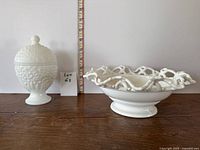 Both milk glass items side by side for size and form reference