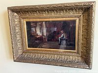 Front view of framed oil painting