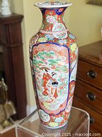 Frontal view showing main figural panel and overall shape