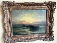 Front view of painting in ornate gilded frame