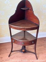 Full view of corner washstand showing overall design and proportions