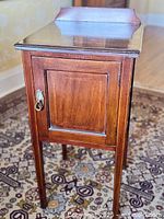 Full view of mahogany bedside cabinet front and top