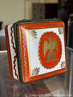 Front angled view showing hinged porcelain trinket box