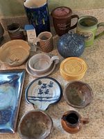 Overview of assorted pottery on countertop