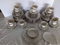 Complete Lenox Carolina dinnerware set displayed on table