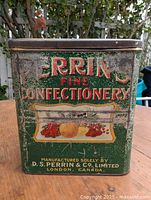 Front view showing brand name, fruit graphic and main panel