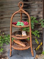 Full view wicker stand with faux food