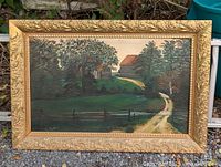 Full view of framed landscape painting
