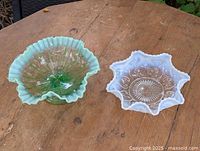 Both opalescent glass candy dishes side by side