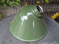 Side view of green enamel barn shade showing angled profile and finish