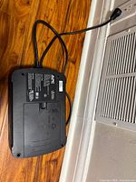 Bottom view showing APC label, venting, integrated power cord