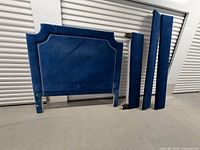 Blue velvet queen headboard and three rails laid out