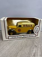 Front view of boxed die-cast panel truck bank