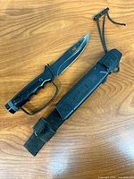 Knife and sheath laid out