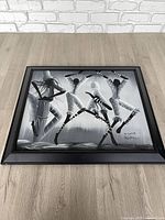 Entire framed painting showing subject and frame