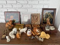 overview of all lion and cat items on table