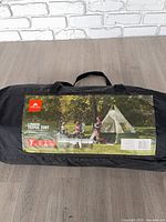 Carry bag showing full product label and handles