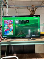 Front view of Sony 48-inch TV displaying on-screen menu