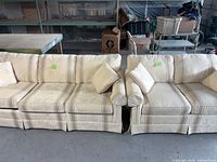 Sofa and loveseat front view with pillows