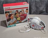 Puzzle box and headphones overview