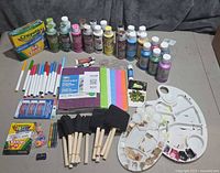 Full view of lot showing paints, palettes, brushes, crayons, markers, foam sheets