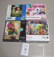 All four puzzle boxes front view