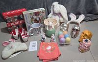 Overview of entire lot showing puzzles, decor, ceramics, plush items and accessories