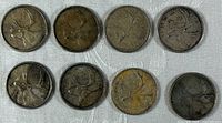 Eight 1960 Canadian quarters reverse side showing caribou design