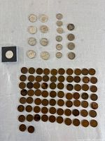 Full layout of all coins grouped by denomination