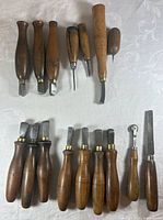 Front view showing all wooden-handled leather tools