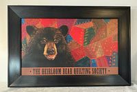 Front view of framed print featuring bear and quilt design