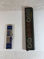 Alco calculator and Addometer adding machine side by side