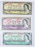 Fronts of the three banknotes showing denominations and serial numbers