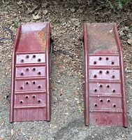 Top view of both metal car ramps with perforated holes