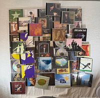 Collage view of all CDs spread out, showing variety and quantity