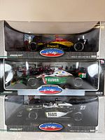 Stacked view of three sealed GreenLight IndyCar boxes