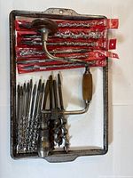 Overview of brace drill, bits and cookie sheet