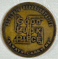 Obverse side with "Health O Representative Always Carry Me" and swastika good luck motif