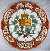 Full view of Wedgwood Toronto commemorative plate showing coat of arms and border