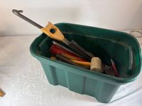 Overview of tote filled with hand tools