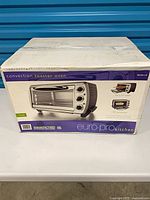 Factory box showing model and appliance image