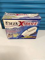 Retail box showing SteamXtreme branding and product image