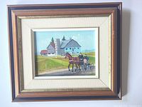 Front view of framed painting showing full artwork and frame